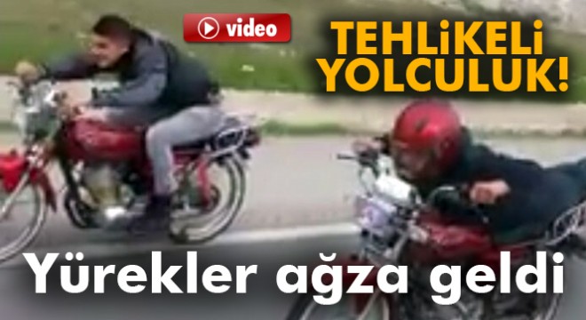 Motosiklet üzerinde tehlikeli yolculuk kamerada